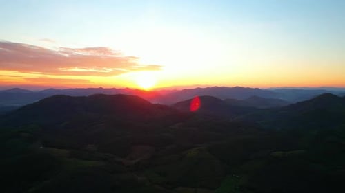 4K Aerial drone of Epic mountain with a colorful sunset drone aerial landscape shot
