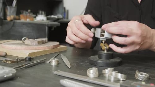 Unrecognizable Jeweler Creating Rings