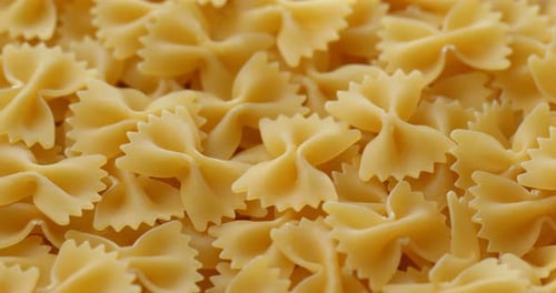 Close Up View of Pile of Dry Farfalle Pasta