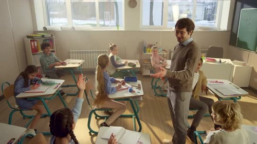 Teacher Lecturing Students in a Classroom