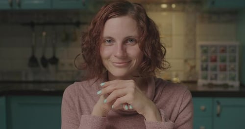 Smiling Woman Portrait in Home Kitchen Interior