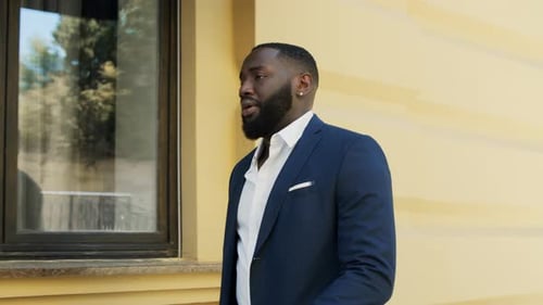 Handsome Afro Businessman Late