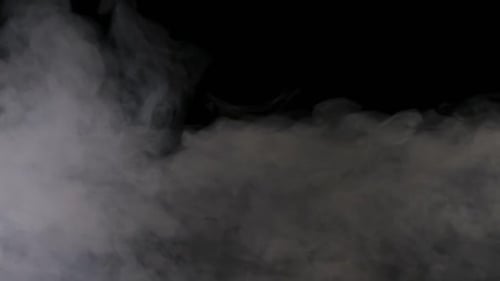Gray Smoke Billowing on Black Background