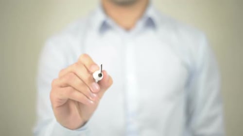 Man Writes E-Mail on Clear Surface