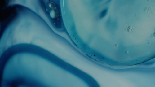 Abstract Background with Swirling Blue and White Colors