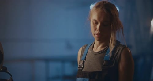 Tired Female Factory Worker After Difficult Day