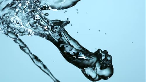 Water Stream Splashing in Abstract Macro Shot