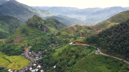 Aerial Drone View Over Picturesque Mountains Landscape with Village in Asia