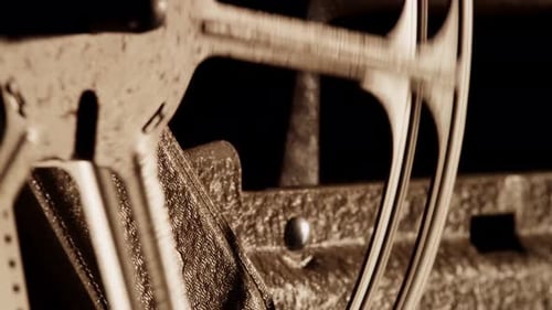 Old Machine Wheel Rotating in Sepia Light