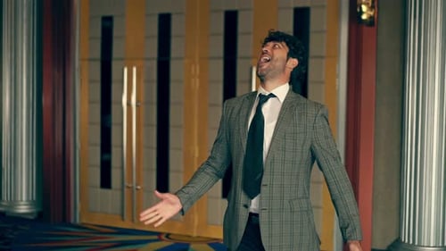 Man Wearing Suit is Dancing Like a Robot
