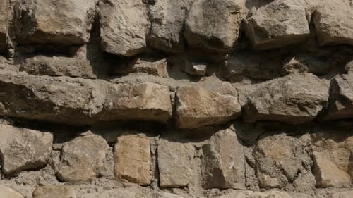 Wall thickness of ancient castle protecting rampart with lot of rock levels 4K 2160p 30fps UltraHD