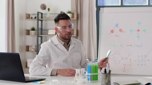 Man Teaching Science Class Online from Home