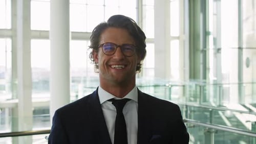 Portrait of young businessman in modern office building