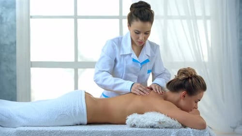 Woman Having Massage of Body in the Spa Salon