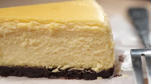 Close Up Slice of Delicious Cheesecake with Cookie Crust