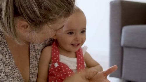 Loving Adult and Infant Bonding Indoors