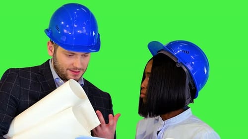 African Woman Caucasian Man Architects Colleagues Talking Discuss Construction Development Plan on a