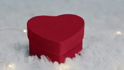 Red Heart Gift Box on Fluffy White Surface
