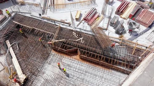 Aerial View of Workers On The Construction Site
