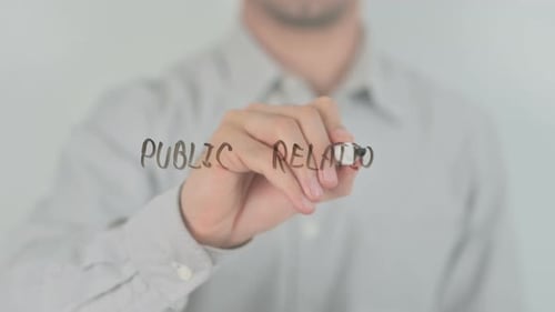 Public Relations Writing on Screen with Hand