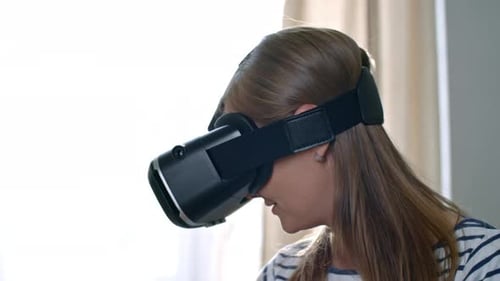 Woman Experiencing Virtual Reality with VR Headset