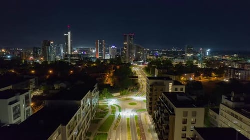 Night view of the city from the air time lapse