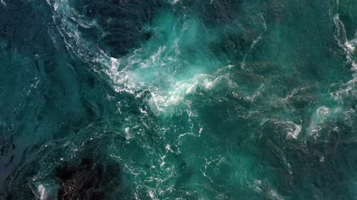 Waves of Water of the River and the Sea Meet Each Other During High Tide and Low Tide