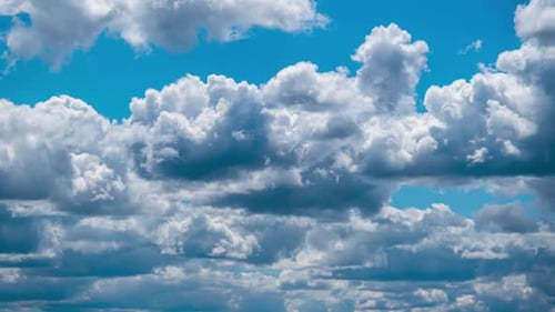 Cumulus Cirrus Clouds Move in the Blue Sky. Time Lapse.