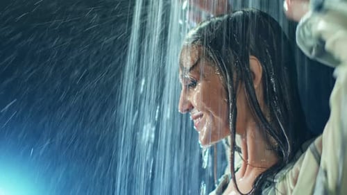 Sexy Dancer Lady with Wet Hair Demonstrate Dance Elements Under Rainy Shower