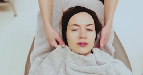 Relaxing Head Massage for Woman at a Spa