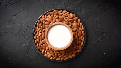Almonds and Milk in Round Bowl Top Shot