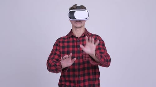 Man Using Virtual Reality Headset, Gesturing