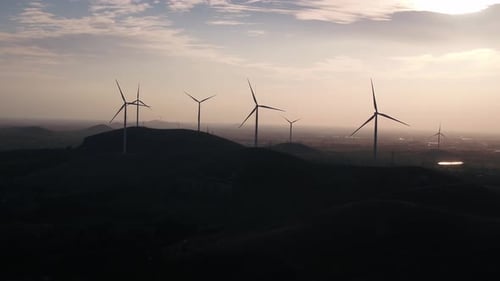 Wind Turbines in mountain during sunset