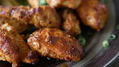 Close Up of Slice of Grill Chicken on a Plate