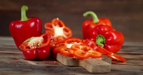 Pieces Ripe Sweet Pepper on Cutting Board Slowly Rotate.