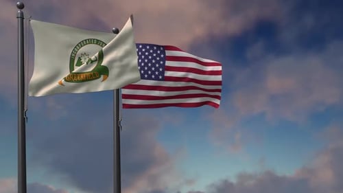 Greenfield Massachusetts and US Flags Waving Against Sky