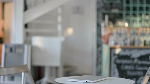 African Man Coming Opening Laptop Cafe