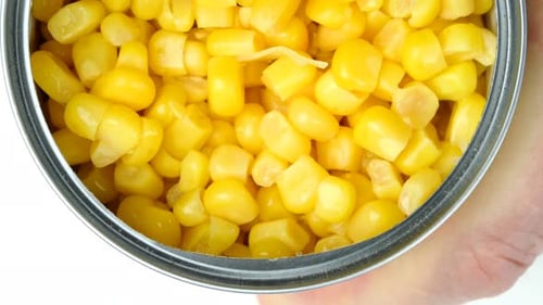 Opening Shiny Can of Sweet Yellow Corn