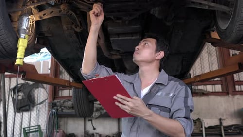 Man checking car