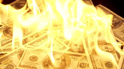 Slow Motion of Dollars Money on Fire Lost Money