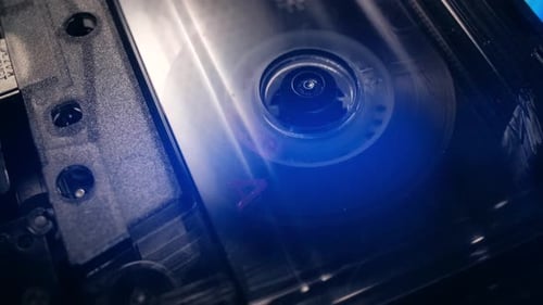 Macro View of Audio Cassette Tape Spinning