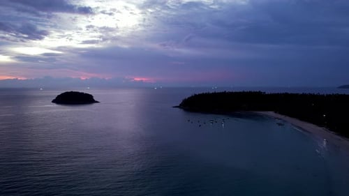 Purple Sunset with a View of the Sea and Clouds