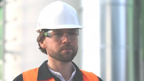 Construction Worker in Safety Gear Smiling