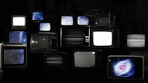 Vintage TVs Displaying Space and White Noise