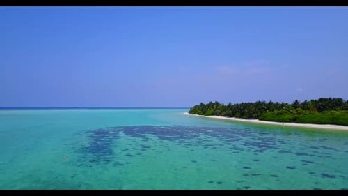 Aerial drone view seascape of exotic seashore beach holiday by transparent water with white sandy ba