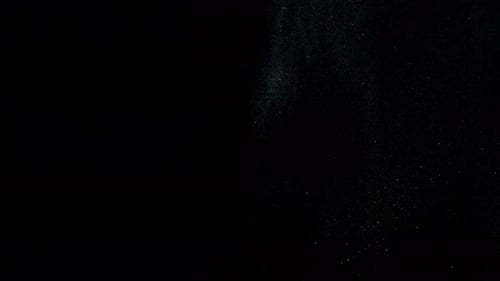 Abstract Dark Background with Twinkling Colorful Stardust