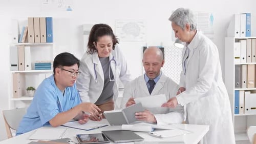 Diverse Scientists Working in Medical Office