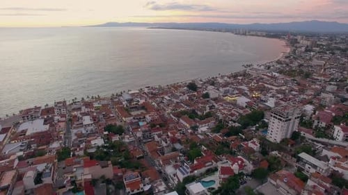 Coastal Cityscape at Sunset, Aerial View