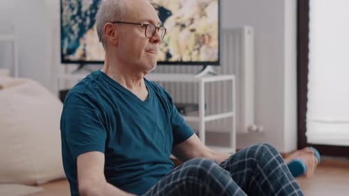 Close Up of Elder Person Training with Dumbbells