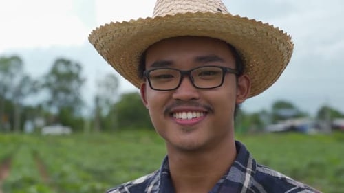 Happy Asian farmer smile